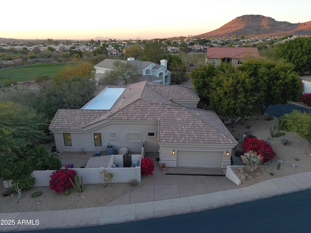 aerial view at dusk with a mountain view