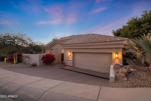 view of front of property featuring a garage