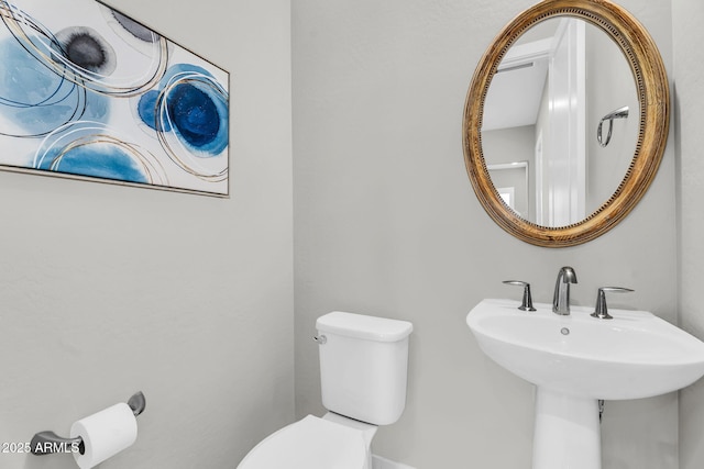 11233 N Blakely St, Surprise, AZ 85388 - half bathroom featuring toilet and a sink