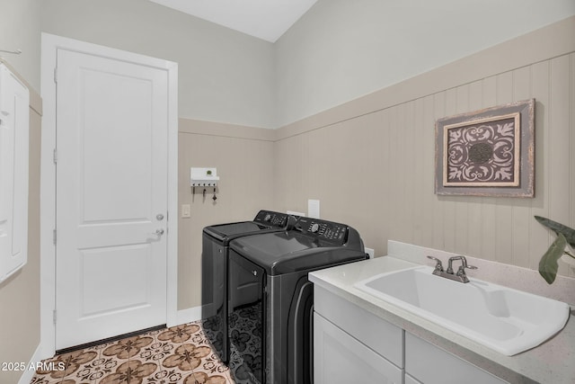 11233 N Blakely St, Surprise, AZ 85388 - washroom featuring washing machine and dryer, a sink, and tile patterned flooring