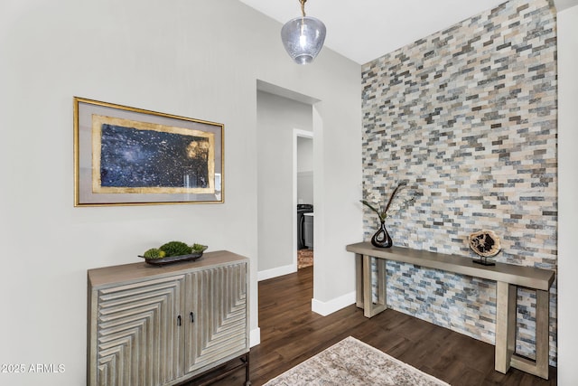 11233 N Blakely St, Surprise, AZ 85388 - corridor with dark wood finished floors, baseboards, and an accent wall