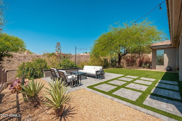 view of yard featuring an outdoor living space and a patio