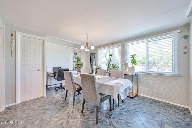 11815 N 112th Dr, Youngtown, AZ 85363 - dining space with plenty of natural light, a chandelier, baseboards, and an office area