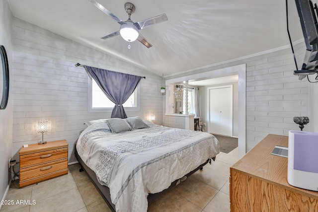 11815 N 112th Dr, Youngtown, AZ 85363 - bedroom with lofted ceiling, light tile patterned flooring, and a ceiling fan