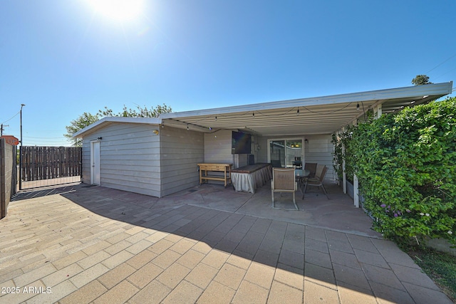 11815 N 112th Dr, Youngtown, AZ 85363 - view of patio featuring fence and outdoor dining space