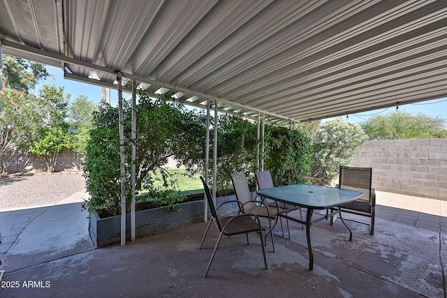 11815 N 112th Dr, Youngtown, AZ 85363 - view of patio / terrace featuring outdoor dining space and a fenced backyard
