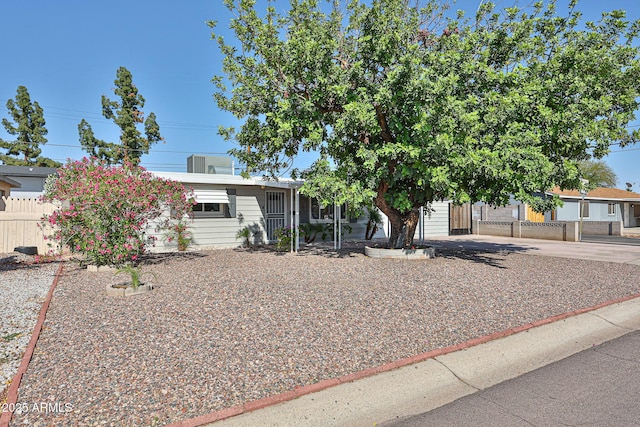 11815 N 112th Dr, Youngtown, AZ 85363 - view of property hidden behind natural elements featuring fence