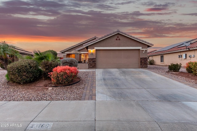 ranch-style home with a garage