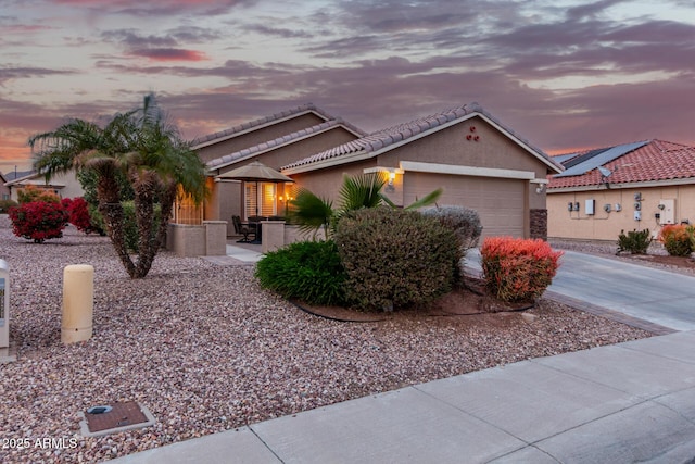 view of front of property featuring a garage