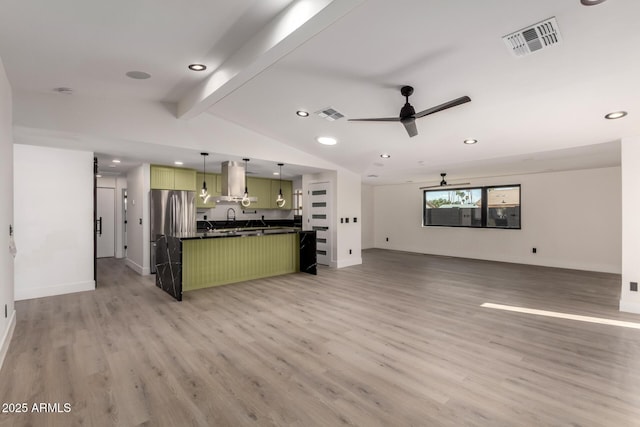 4019 E Surrey Ave, Phoenix, AZ 85032 - unfurnished living room featuring light wood-style floors, recessed lighting, and visible vents