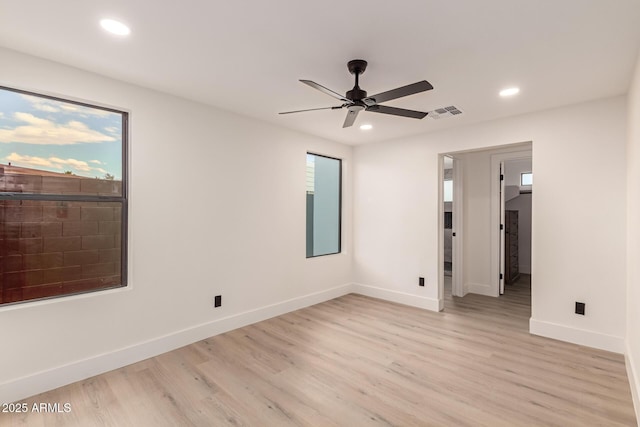 4019 E Surrey Ave, Phoenix, AZ 85032 - spare room with light wood-style floors, a ceiling fan, and recessed lighting