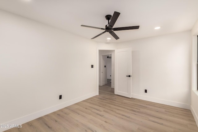 4019 E Surrey Ave, Phoenix, AZ 85032 - spare room with light wood-style flooring, ceiling fan, recessed lighting, and baseboards