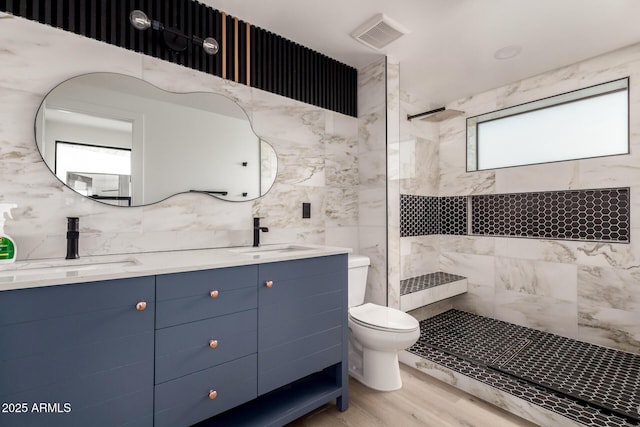 4019 E Surrey Ave, Phoenix, AZ 85032 - bathroom featuring a walk in shower, visible vents, a sink, and toilet