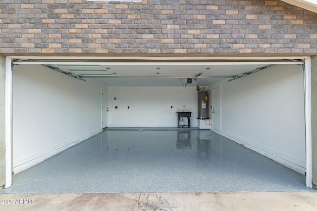 4019 E Surrey Ave, Phoenix, AZ 85032 - garage featuring a garage door opener, baseboards, and water heater
