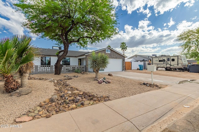 4019 E Surrey Ave, Phoenix, AZ 85032 - single story home featuring an attached garage, concrete driveway, and fence