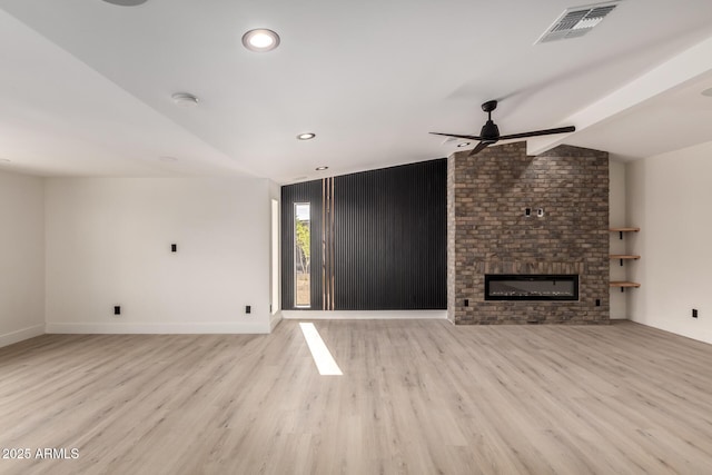 4019 E Surrey Ave, Phoenix, AZ 85032 - unfurnished living room featuring lofted ceiling with beams, a ceiling fan, visible vents, wood finished floors, and baseboards