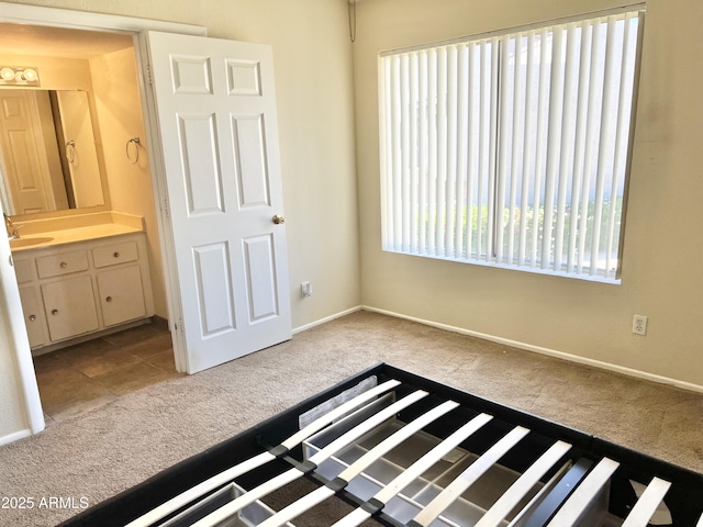 19601 N 7th St Ave Unit 1036, Phoenix, AZ 85024 - unfurnished bedroom featuring light carpet and baseboards