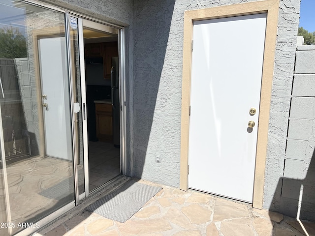 19601 N 7th St Ave Unit 1036, Phoenix, AZ 85024 - doorway to property with stucco siding