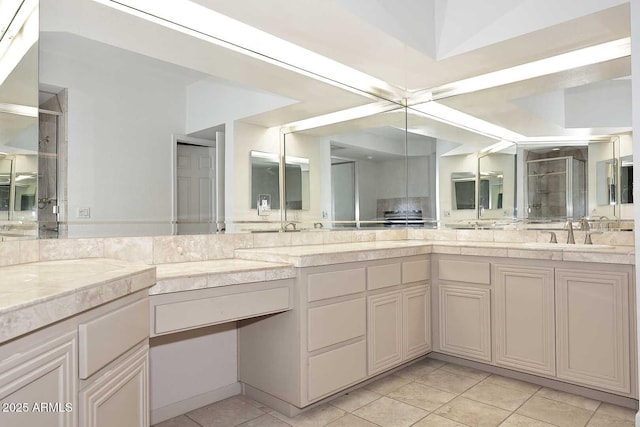 bathroom with vanity and tile patterned floors