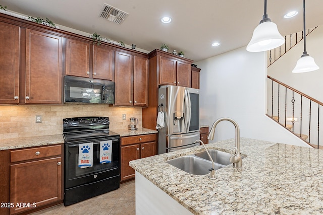 kitchen featuring tasteful backsplash, visible vents, a sink, black appliances, and light tile patterned flooring