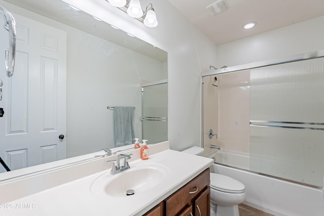 bathroom with visible vents, bath / shower combo with glass door, toilet, recessed lighting, and vanity