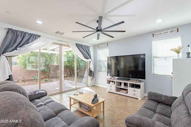 living area featuring visible vents, a ceiling fan, tile patterned flooring, and recessed lighting
