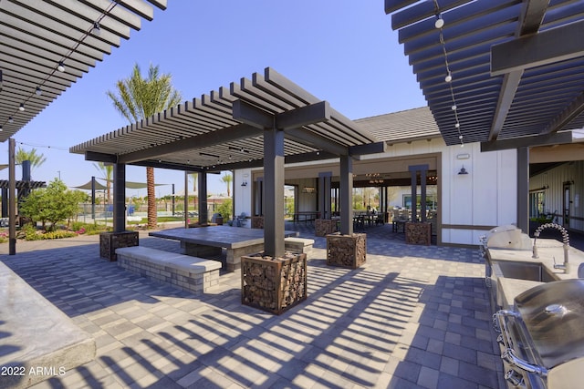 view of patio / terrace featuring outdoor dining area, area for grilling, and a pergola