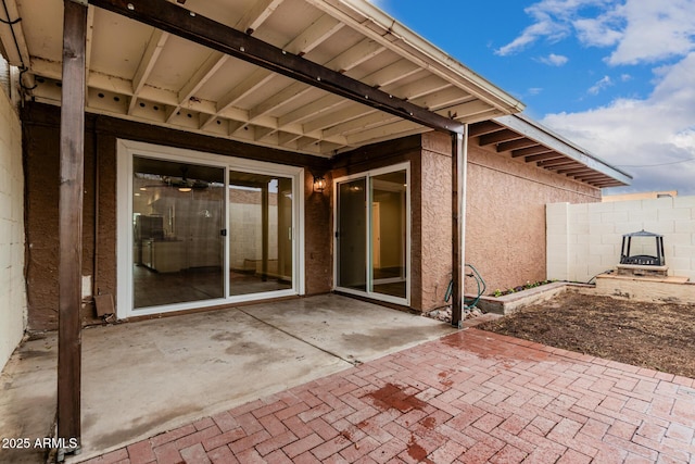 view of patio / terrace with fence