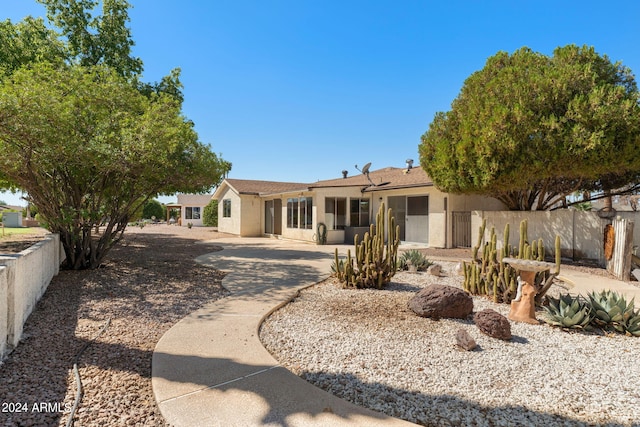 rear view of property with a patio area