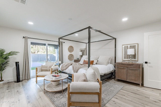 bedroom with light hardwood / wood-style flooring