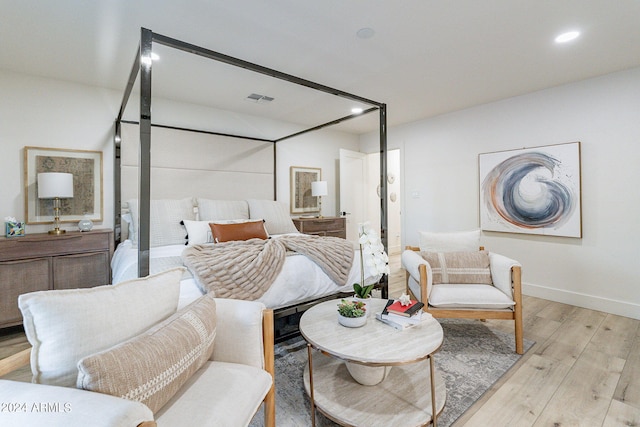 bedroom featuring light hardwood / wood-style flooring