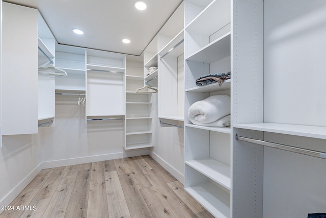 walk in closet featuring light wood-type flooring