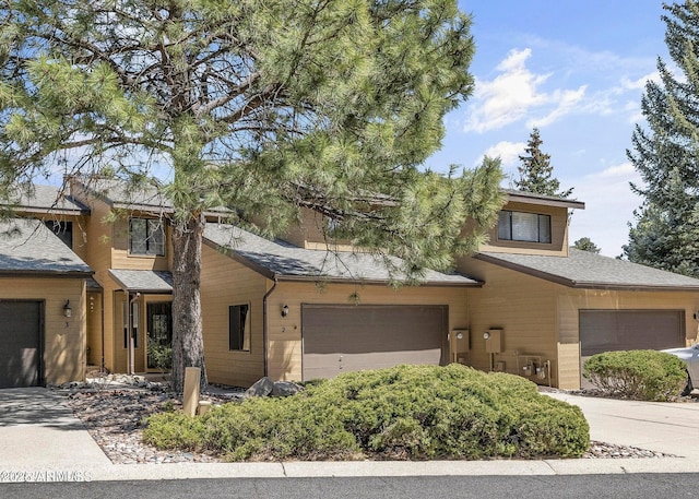 2800 N Saddleback Way Unit 2, Flagstaff, AZ 86004 - view of front of home featuring driveway and a shingled roof