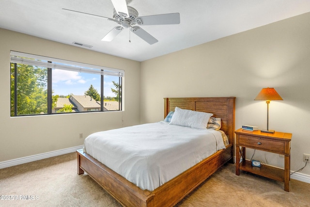 2800 N Saddleback Way Unit 2, Flagstaff, AZ 86004 - carpeted bedroom featuring baseboards, visible vents, and a ceiling fan