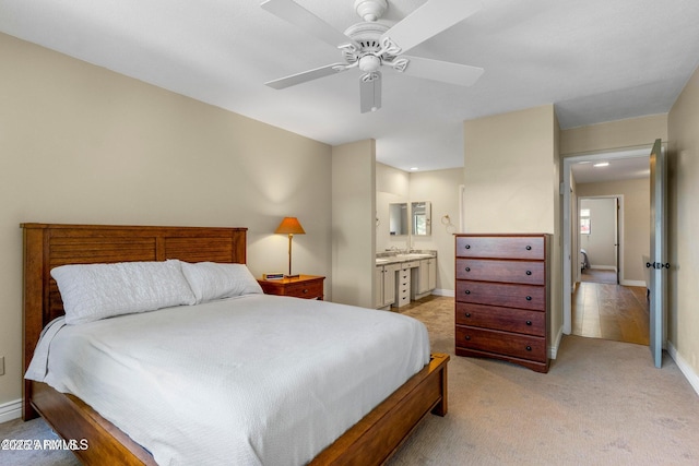 2800 N Saddleback Way Unit 2, Flagstaff, AZ 86004 - bedroom featuring baseboards, a ceiling fan, light carpet, and ensuite bathroom