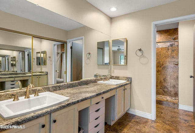 2800 N Saddleback Way Unit 2, Flagstaff, AZ 86004 - bathroom with a sink, tiled shower, and baseboards