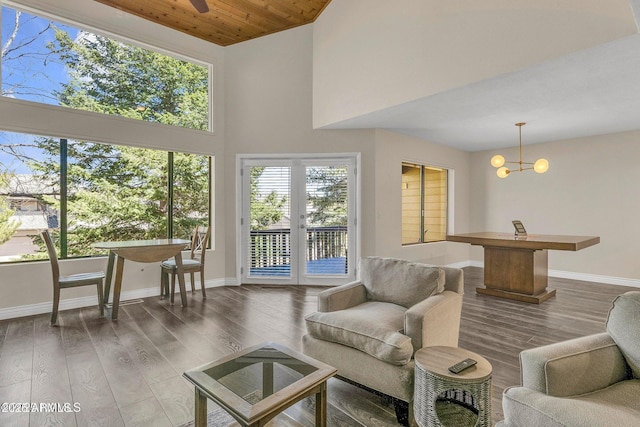 2800 N Saddleback Way Unit 2, Flagstaff, AZ 86004 - living room with a towering ceiling, wood finished floors, and baseboards