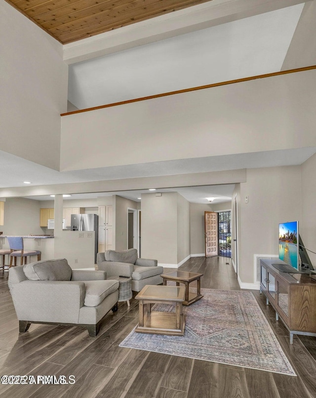 2800 N Saddleback Way Unit 2, Flagstaff, AZ 86004 - living area with a towering ceiling, wood finished floors, and baseboards