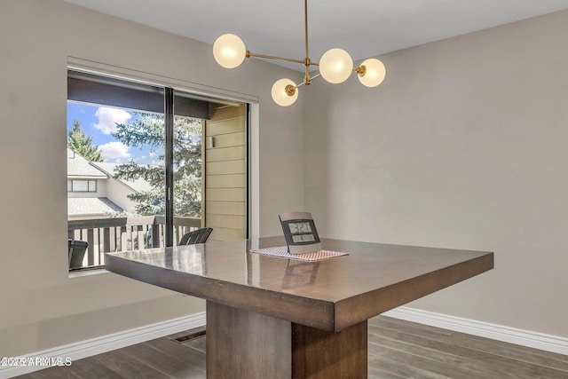 2800 N Saddleback Way Unit 2, Flagstaff, AZ 86004 - unfurnished dining area with dark wood finished floors and baseboards