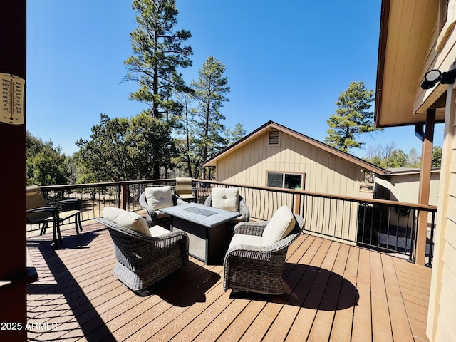 deck featuring outdoor lounge area