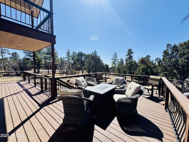 deck featuring an outdoor living space