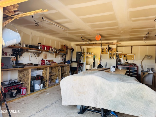 garage with a workshop area