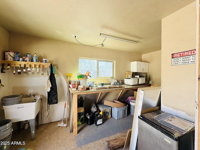 kitchen featuring white cabinets