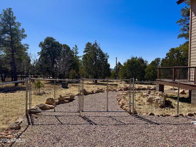 view of yard featuring a gate and fence