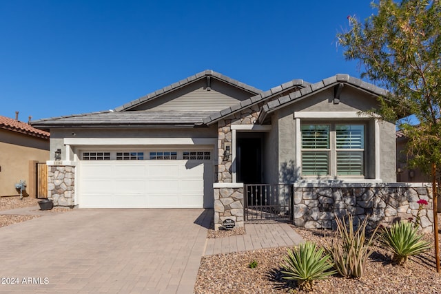 view of front of home featuring a garage