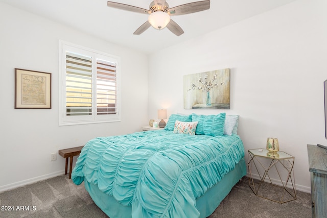 bedroom with ceiling fan and carpet flooring