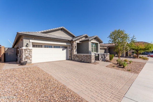 single story home with a garage