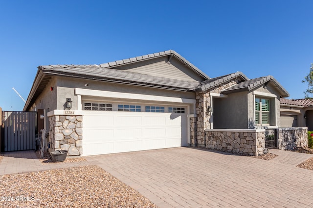 view of front of home featuring a garage