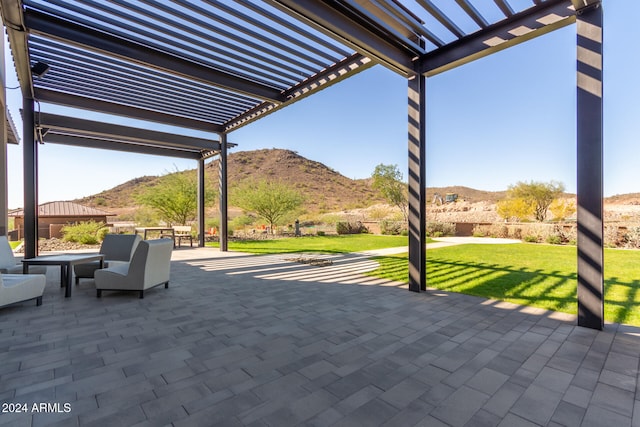 view of patio / terrace featuring a mountain view