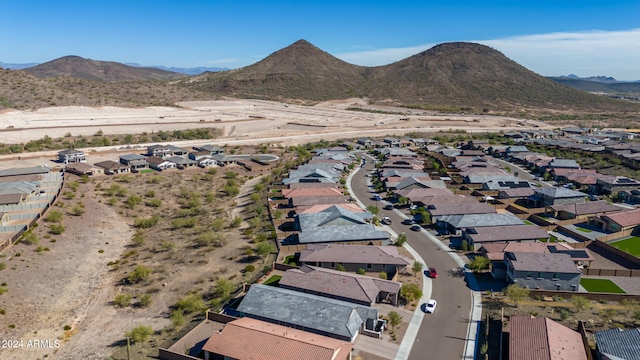 birds eye view of property featuring a mountain view